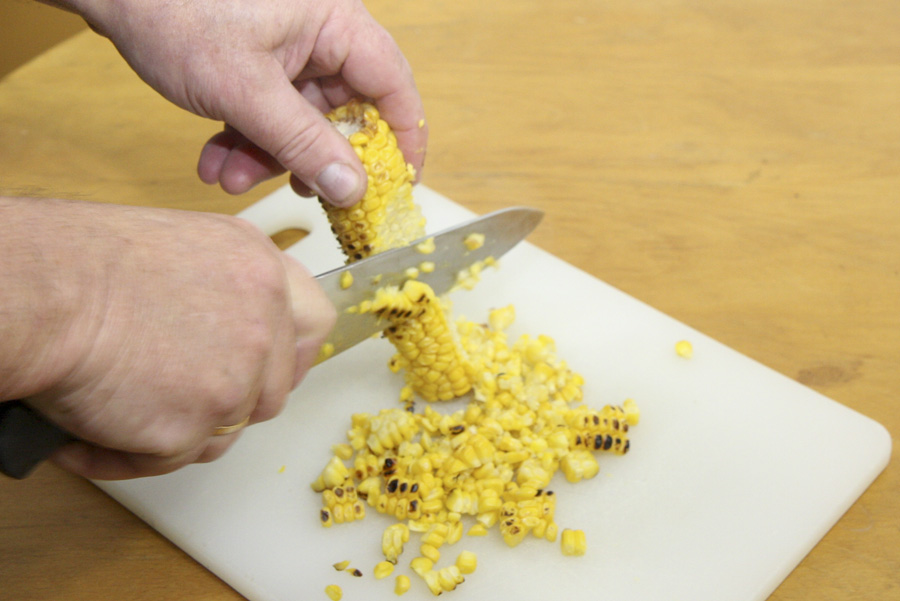 Stripping corn from the cob.jpg.