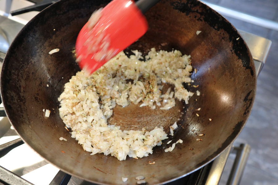 Soutzoukakia frying the onion.jpg.