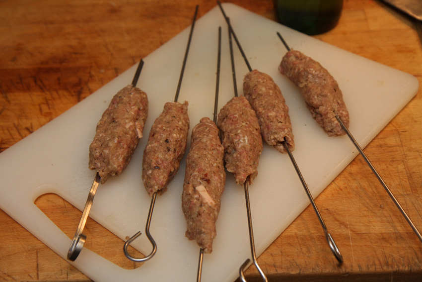 Moroccan kebab sticks ready to grill.jpg.