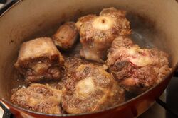 Brown the oxtails