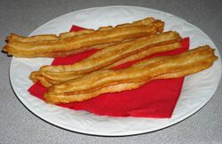 Home-made, frozen and cooked churros