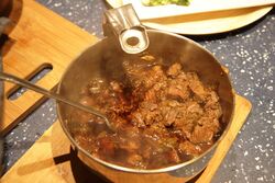 Cooked, in my saucepan I modified to fit in a pressure cooker