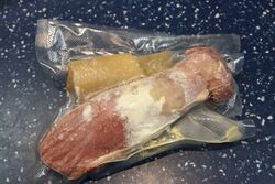 Pork fillet vacuum sealed and ready to marinade for 6 hours in the sous-vide bath.