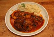 Braised Lamb Shanks with cherries and apricots served with plain couscous