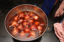 Blanche in boiling water for 3 minutes then top, tail and peel them