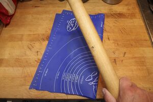 Bashing them with a rolling pin