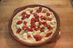 Topped with mozzarella and tomatoes