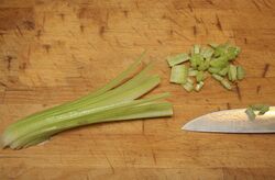 Slice the celery lengthwise in both directions before chopping so you get a very fine dice