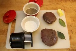 Meat tenderiser with the ingredients