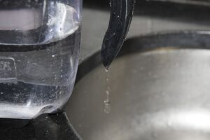 The only way to use the jug is to hang it over the side of the sink!