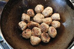 Frying half of the the meatballs